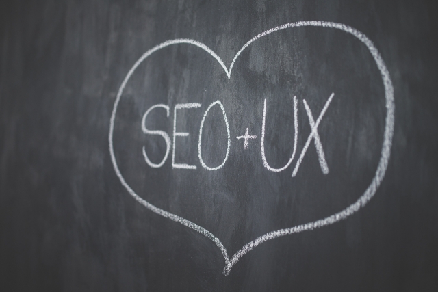 Chalkboard heart with words SEO UX 